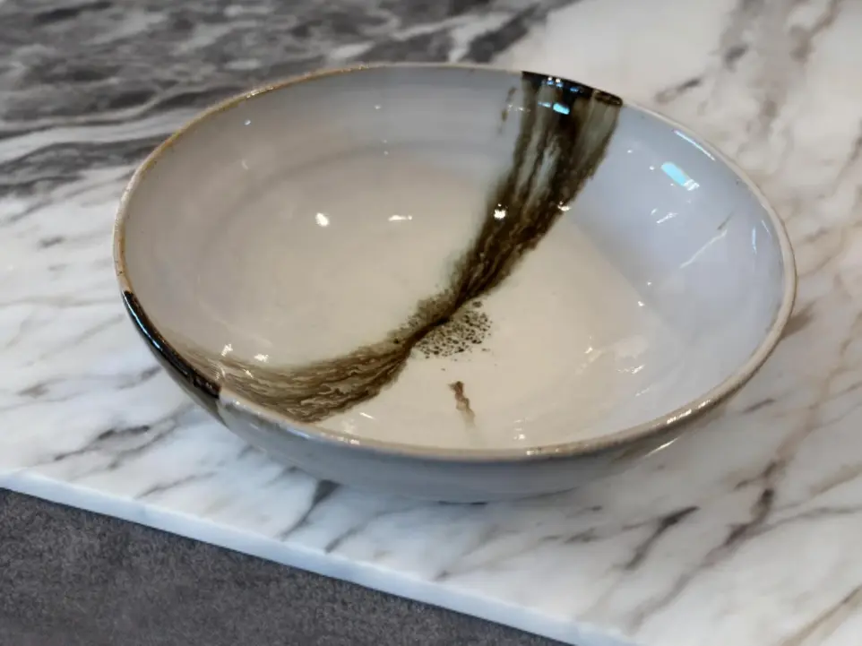 Minimal yet expressive, it's a piece that holds both space and presence. A vessel not just for food but for stillness.